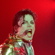 Michael Jackson performs on stage during is “HIStory” world tour concert November 10, 1996 in Auckland, New Zealand.